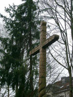 Lovely carved wooden cross out front