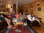 The extended family gathers around the fireplace on our last evening, June 29 (in front of the camera on self-timer).