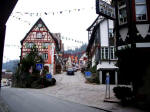 Graceful downtown Schiltach, resplendent with culture and craft trade, with flags for Fasching.