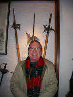 Joe strikes a pose at the medieval weapons exhibit.